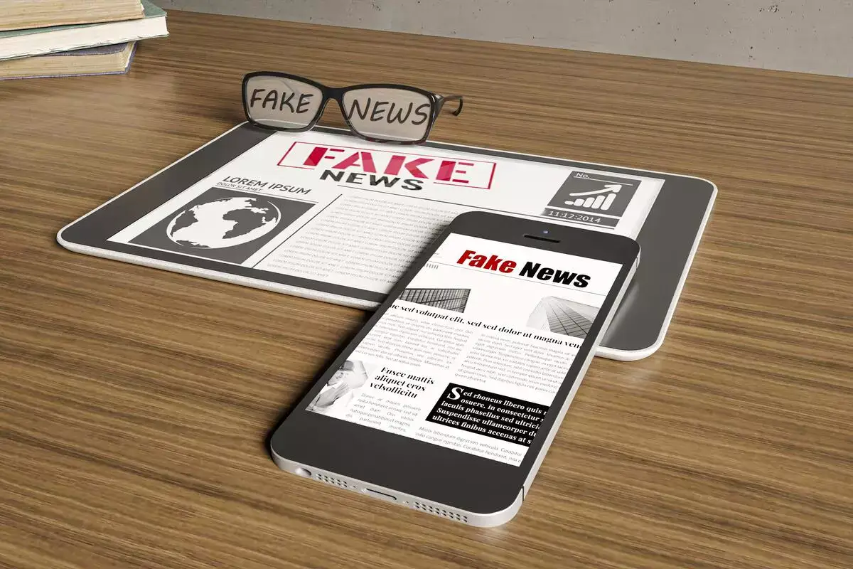 high angle glasses smartphone with fake news press release